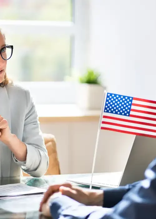 immigration lawyer talking with a client to speed up his process